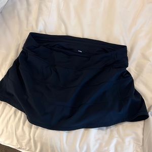 navy lulu skirt with spandex shorts.